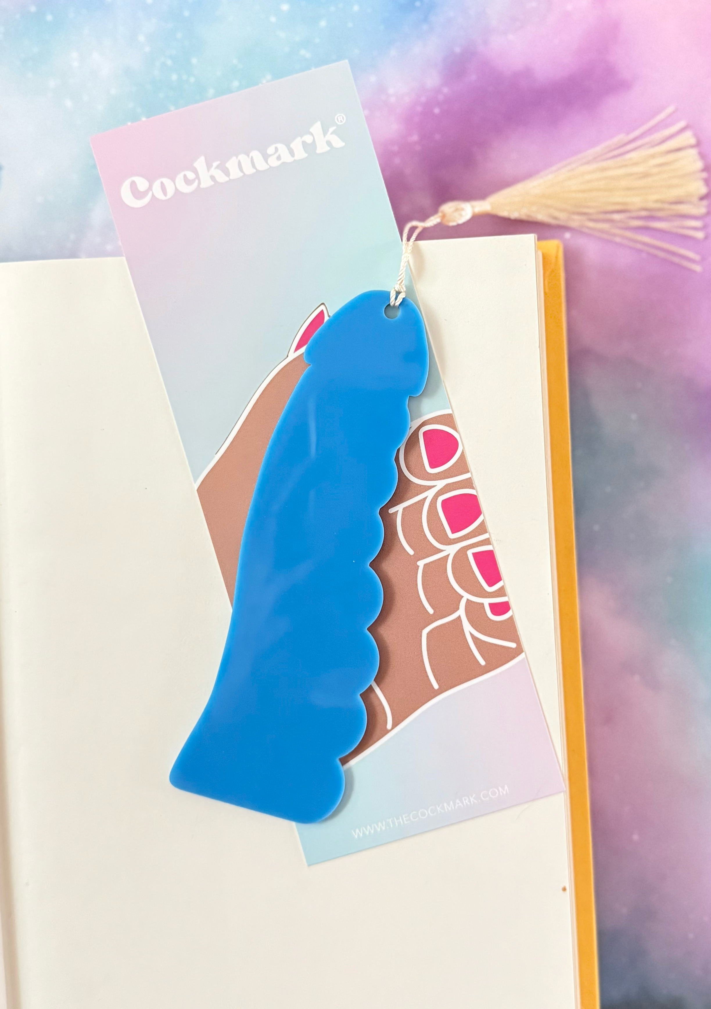 Blue leaf-shaped product on a colorful background with &