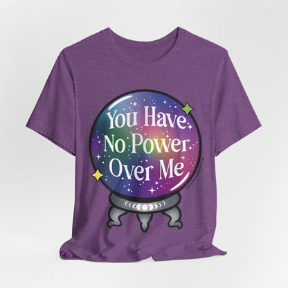 A purple short-sleeve t-shirt with a graphic of a crystal ball containing a galaxy pattern and the text &