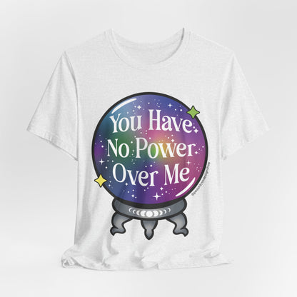 A white short-sleeve t-shirt with a graphic of a crystal ball containing a purple and blue galaxy design with the text &