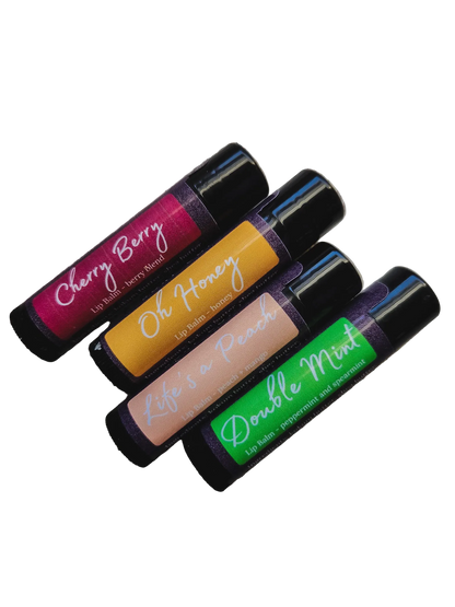 Four lip balm tubes with different flavors on a white background