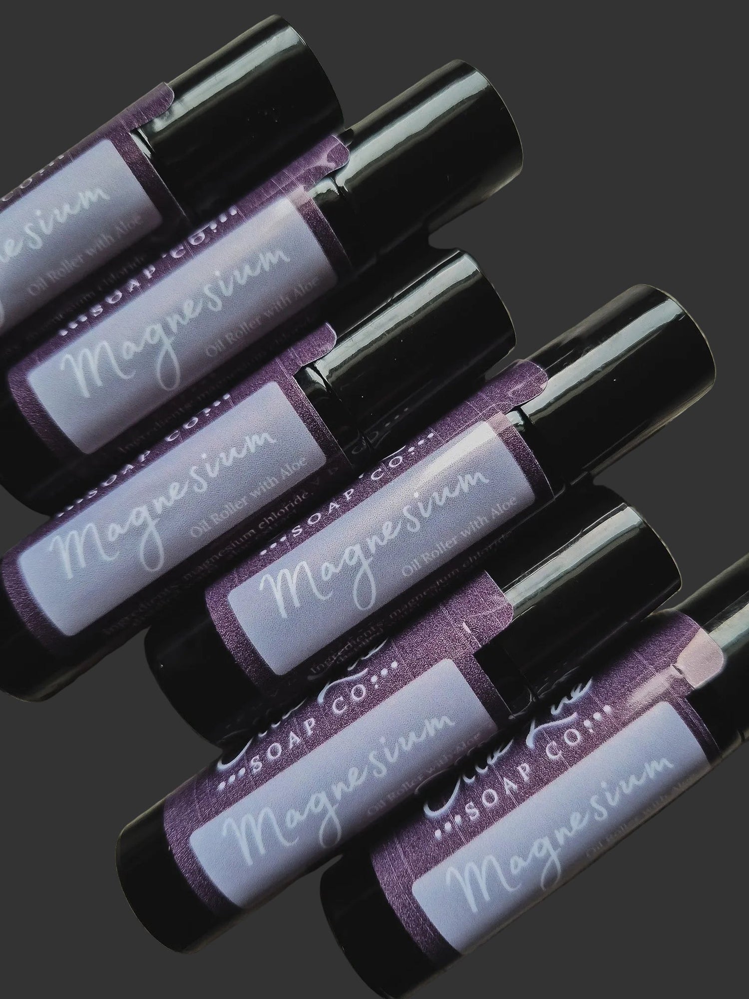 Roll-on bottles labeled &