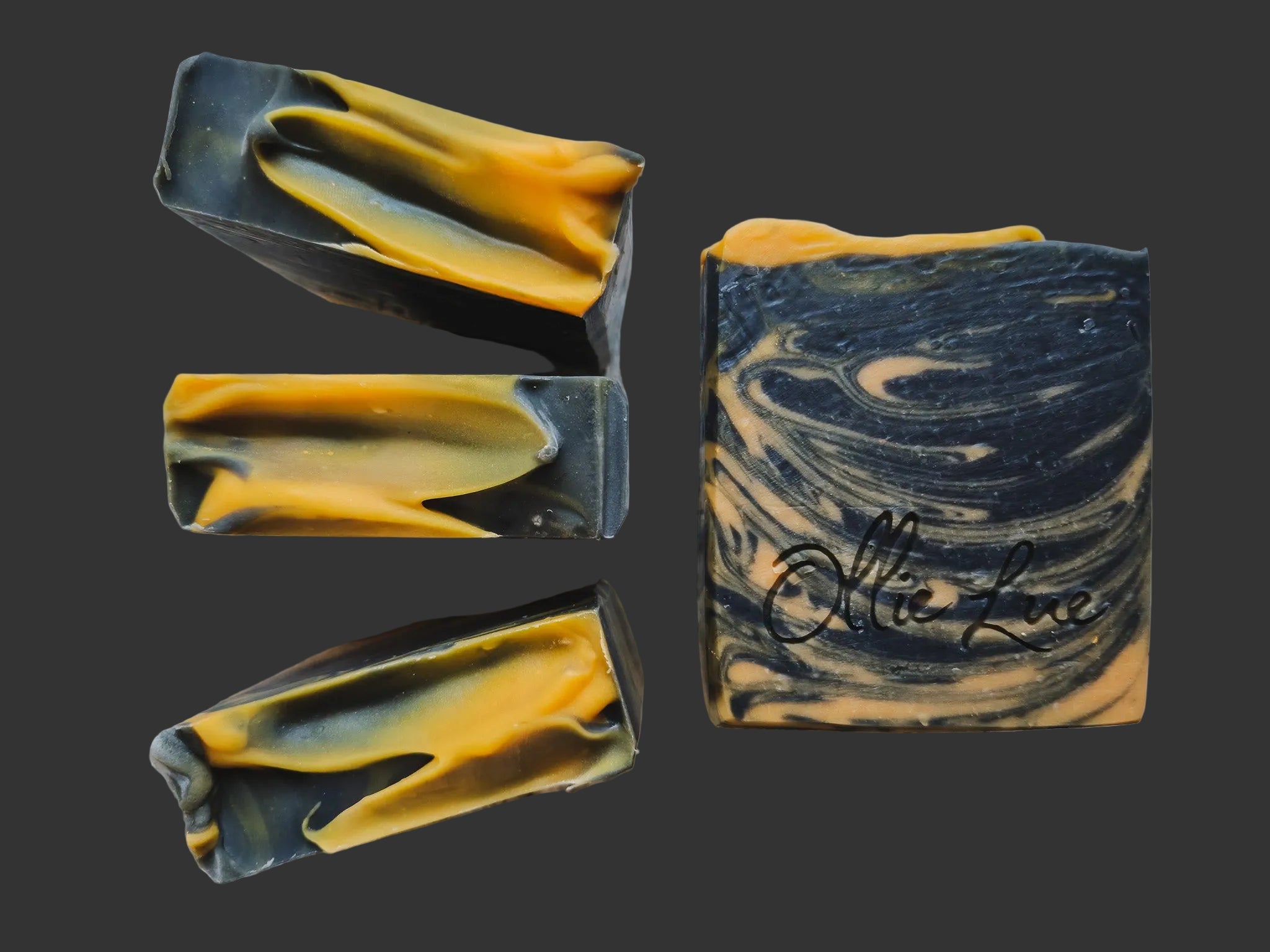 black and orange swirled soap stamped &