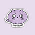 A die-cut sticker featuring a cartoon purple cat with a grumpy expression and the text &
