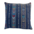 Decorative pillow with blue and multicolor pattern on a white background