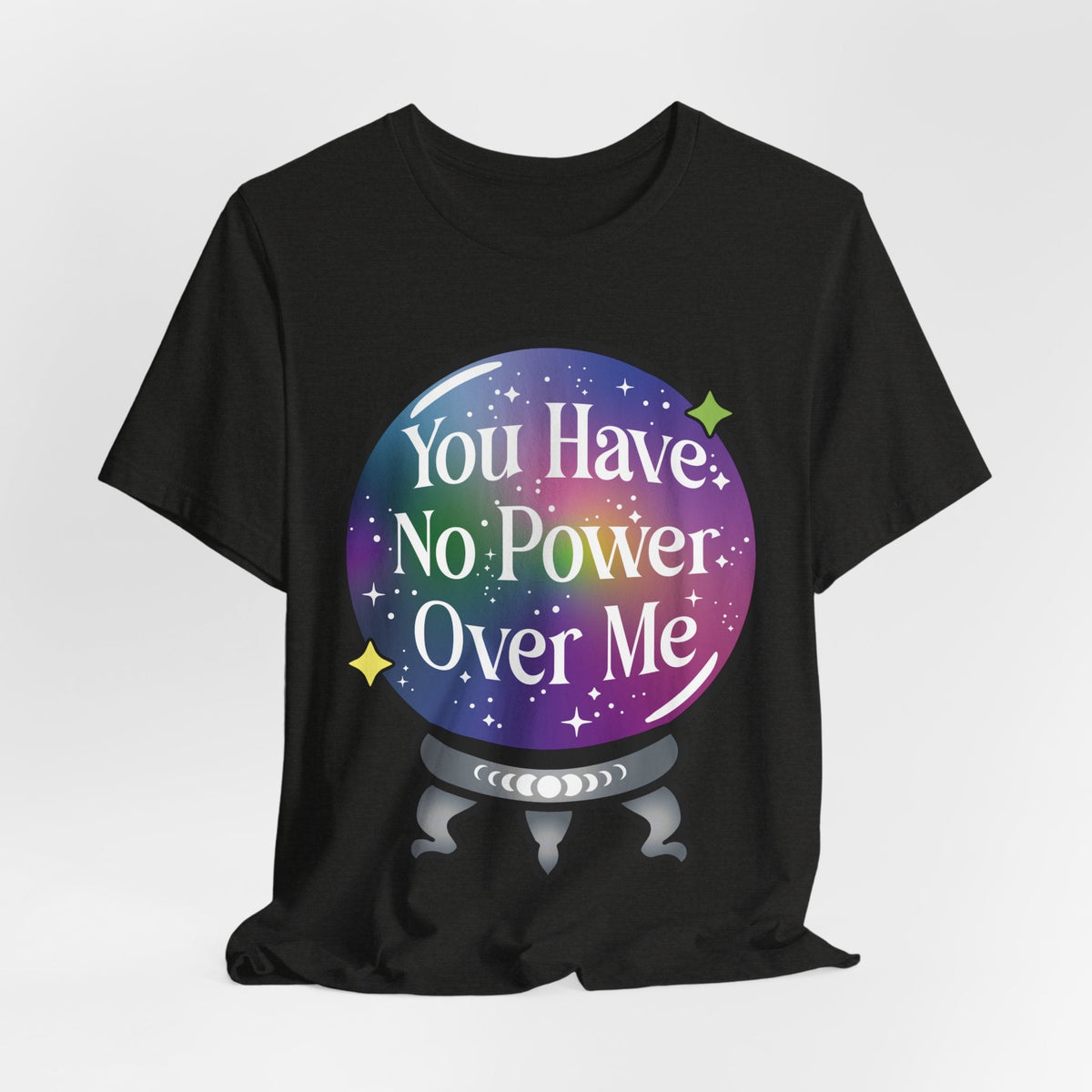 A black short-sleeve t-shirt with a colorful graphic of a crystal ball containing stars and the text &