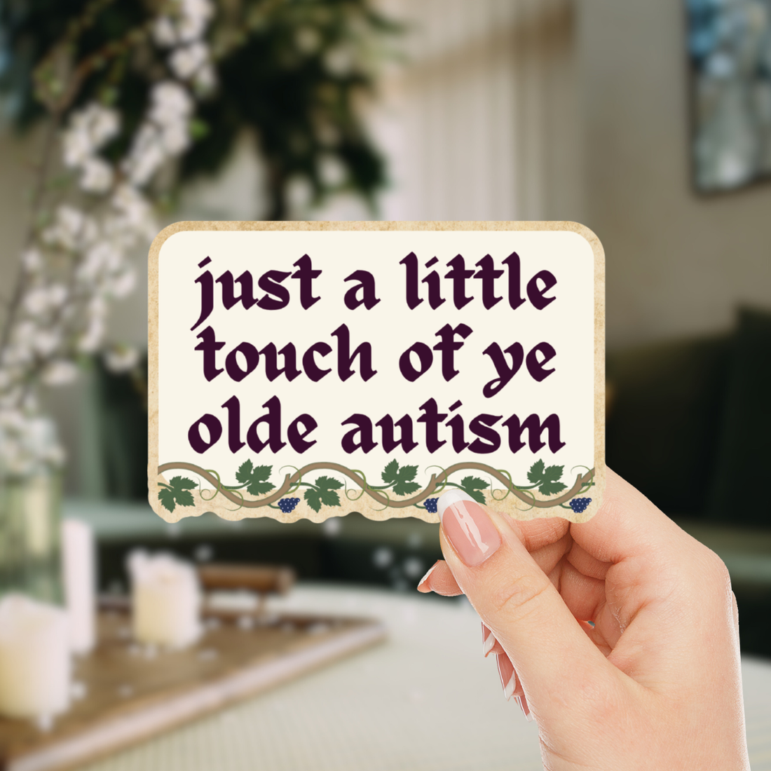 Hand holding a sign with text &
