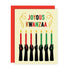 A Kwanzaa greeting card with a red envelope, featuring the words &