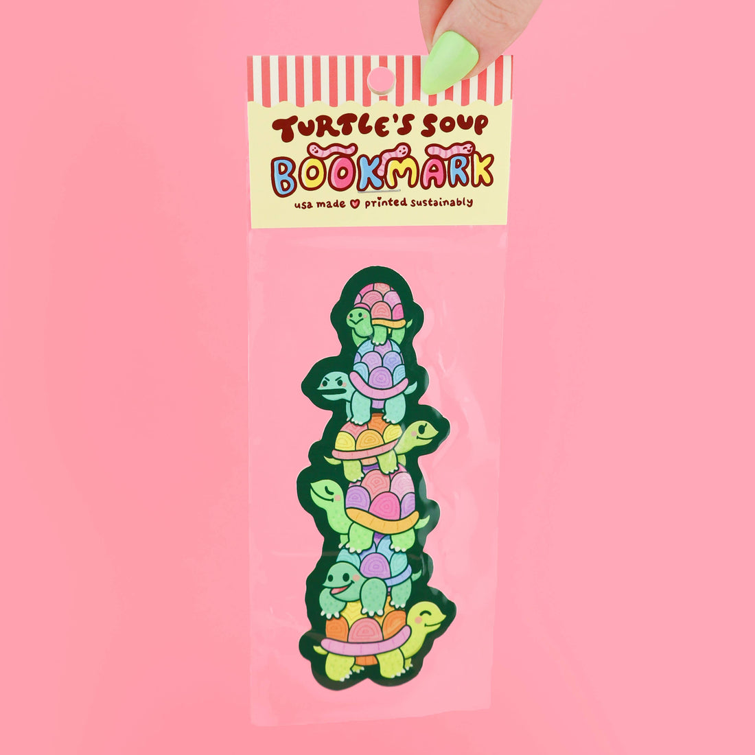 Colorful turtle-shaped bookmark in packaging with &