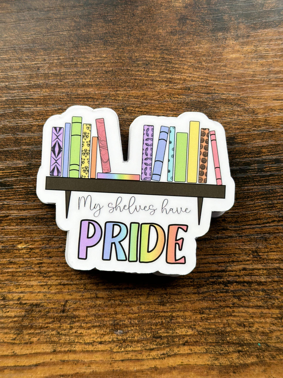 Sticker with rainbow books and &