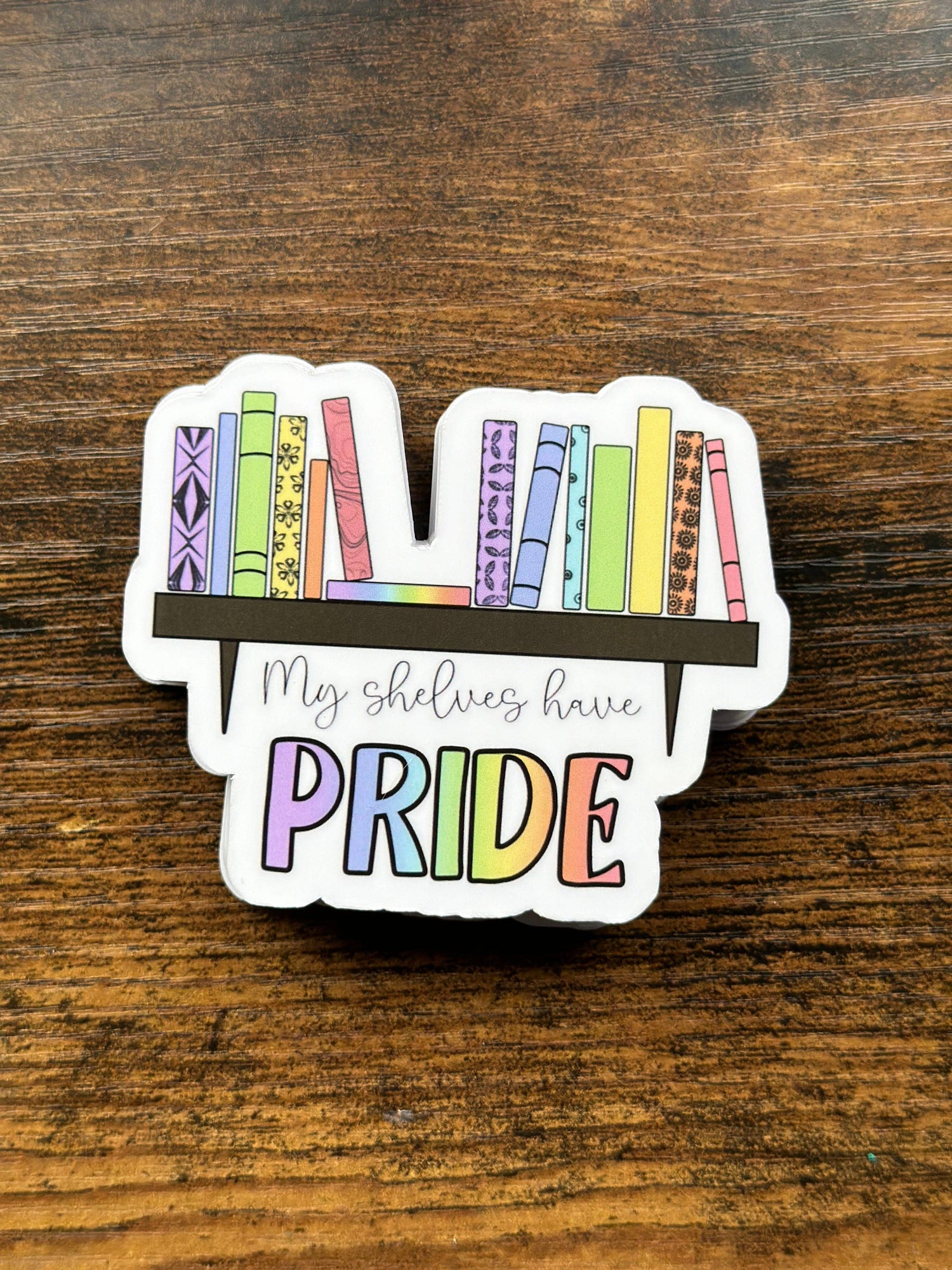 Sticker with rainbow books and &