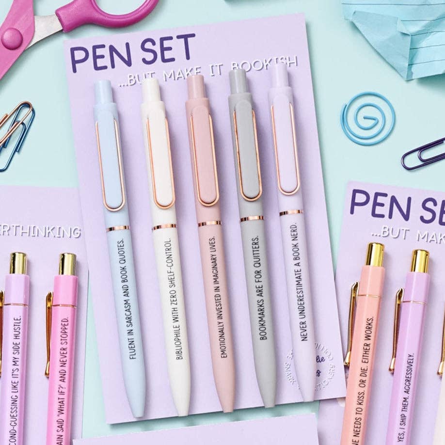 Set of pens with unique phrases on a pastel background