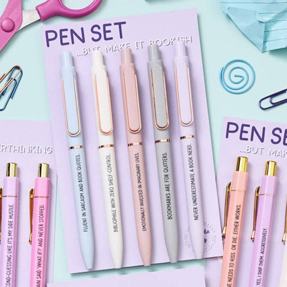 Set of pens with unique phrases on a pastel background