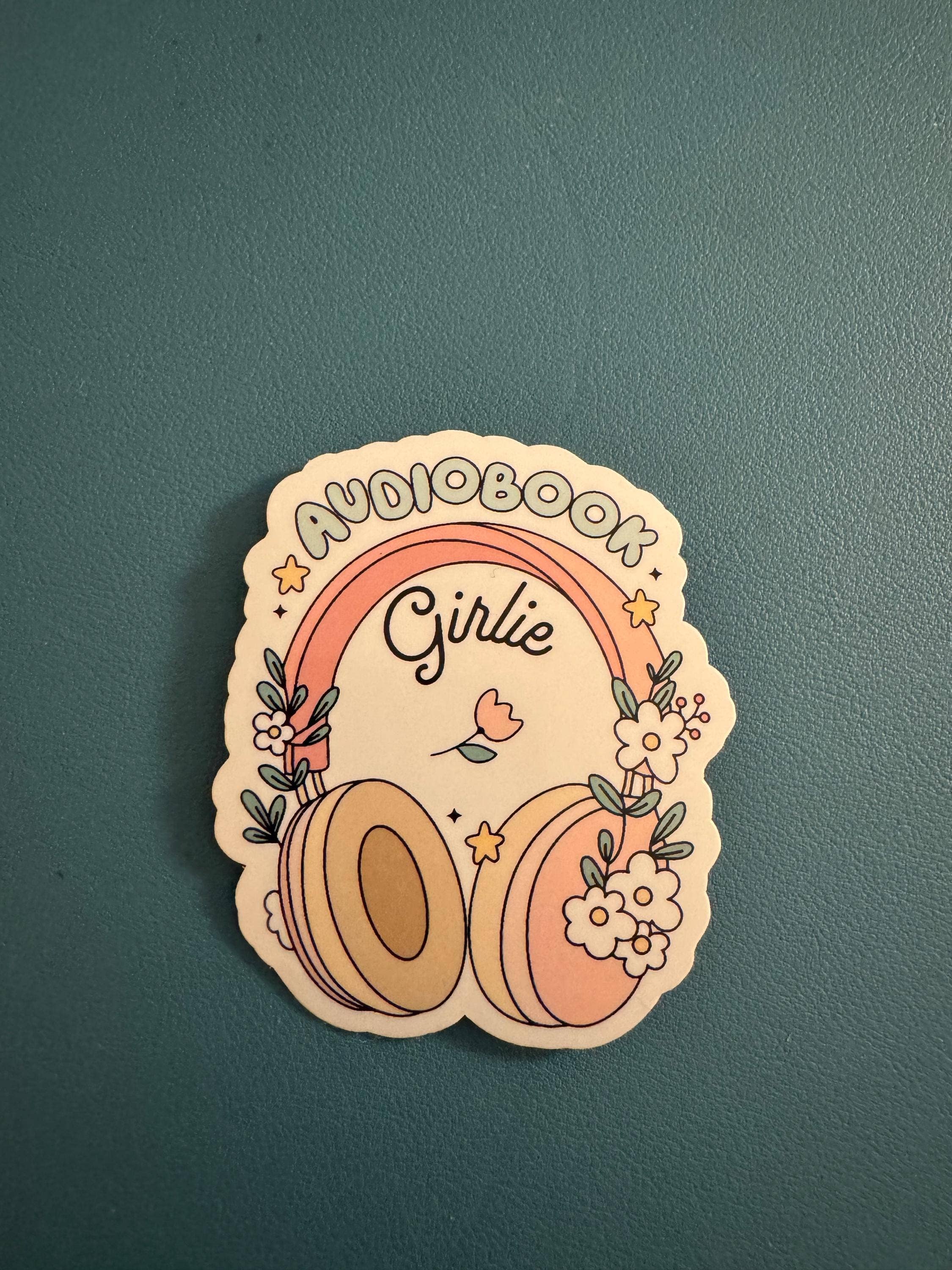 A die-cut sticker featuring a retro-style illustration with the words &