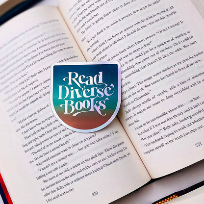 A shield-shaped book bookmark with the words &