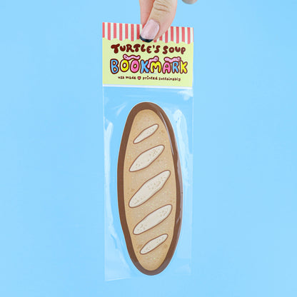 Bookmark shaped like a loaf of bread in clear packaging with &