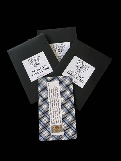 Set of tarot cards with black card holders on a white background