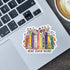 Sticker with books and flowers on a laptop