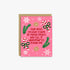 A pink Christmas greeting card with a kraft envelope, featuring holiday illustrations like snowflakes, candy canes, pine branches, bows, and gold stars, with the text &