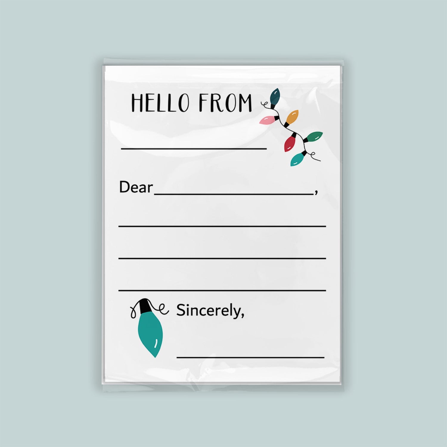 The image is a blank greeting card with a message that reads "Hello from" and a decorative element of colorful lights.