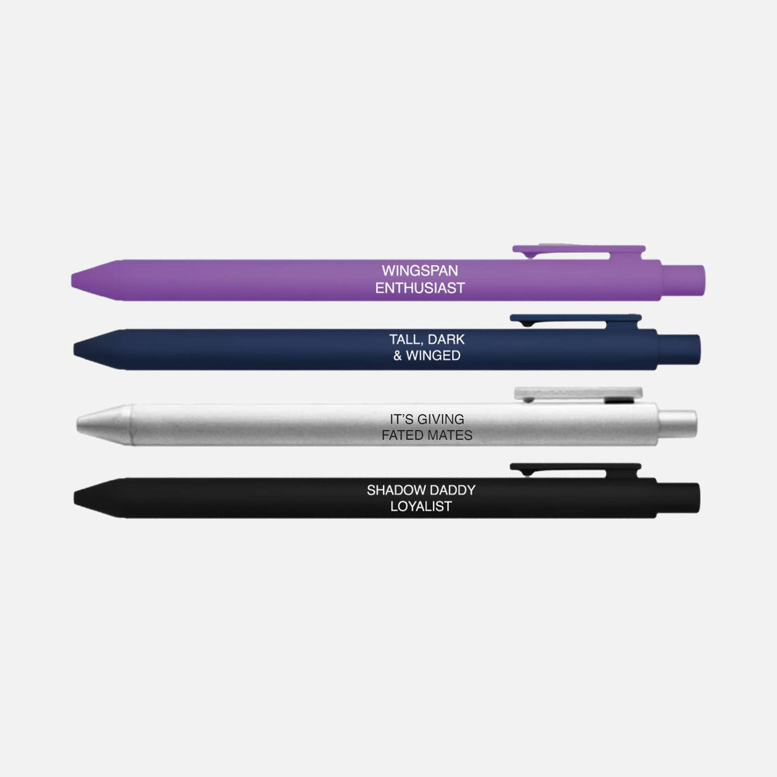 Four pens of different colors with text on a light gray background