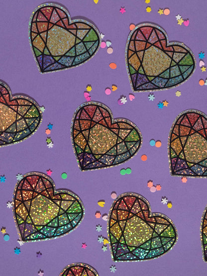 Colorful heart-shaped stained glass patterns on a purple background with confetti.