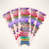 Stack of colorful book genre labels on a white background