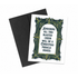 A Christmas greeting card with a black envelope, featuring a white card with a dark green ornate frame and the text &