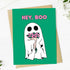 Greeting card with a ghost holding flowers and &