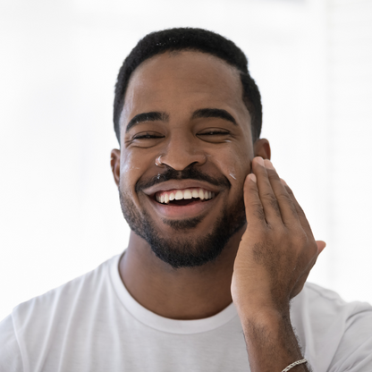 Eonian skincare for men, Soveregin skin balm for aftershave face care. Man applying aftershave cream
