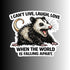 A die-cut sticker featuring a cartoon opossum with an open mouth and the text &
