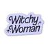 A die-cut sticker with the words &