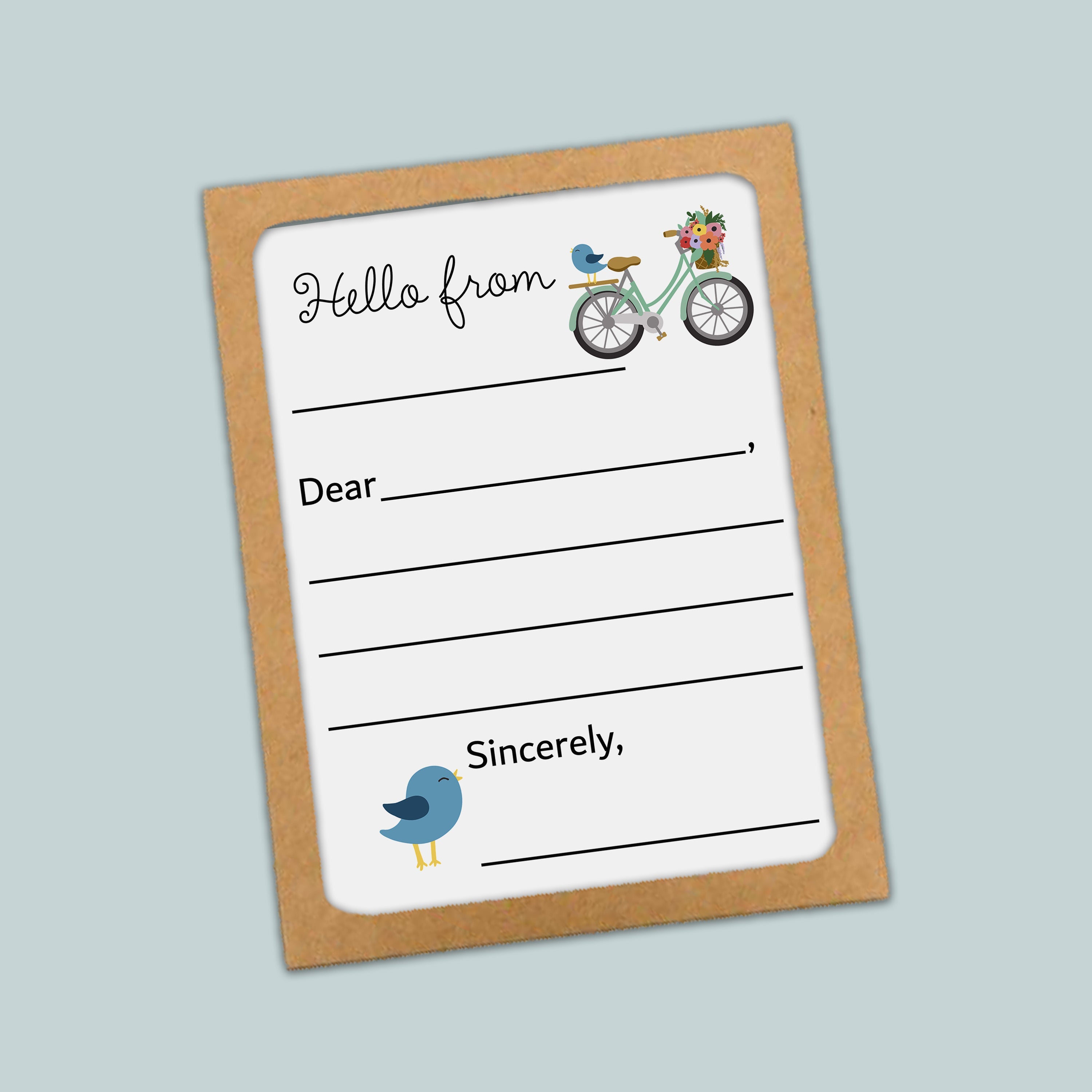 The image is a greeting card with a bicycle and a bird on it. The card has a blank space for a message and a blank space for a name.