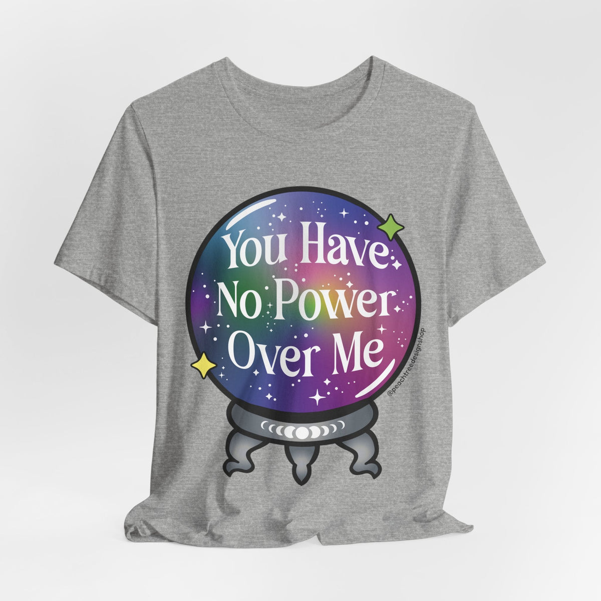 A heather gray short-sleeve t-shirt with a graphic of a crystal ball containing a purple and blue galaxy design with the text &