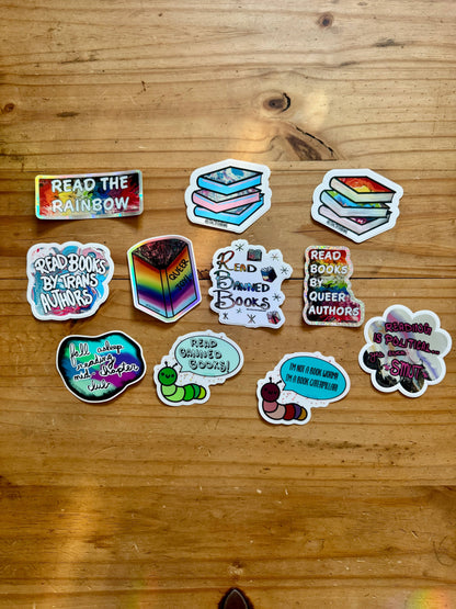Collection of colorful stickers on a wooden surface