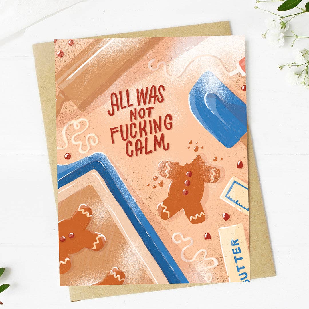 A square greeting card with a gingerbread-themed illustration and the text &