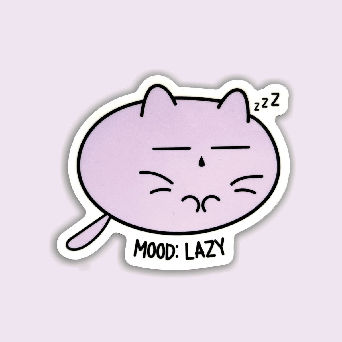A die-cut sticker featuring a cartoon purple cat sleeping with closed eyes and the text &