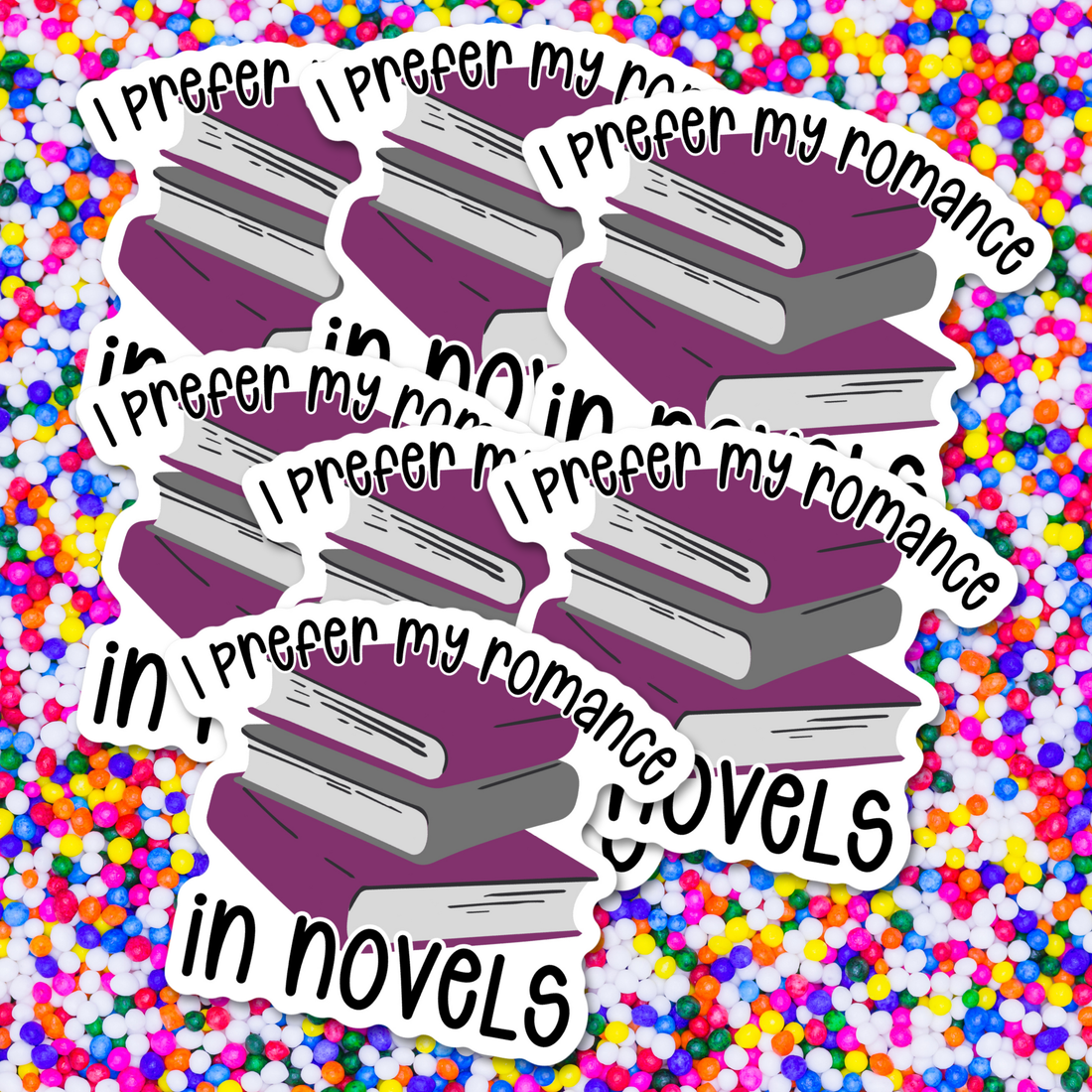 Sticker with a stack of books and text &