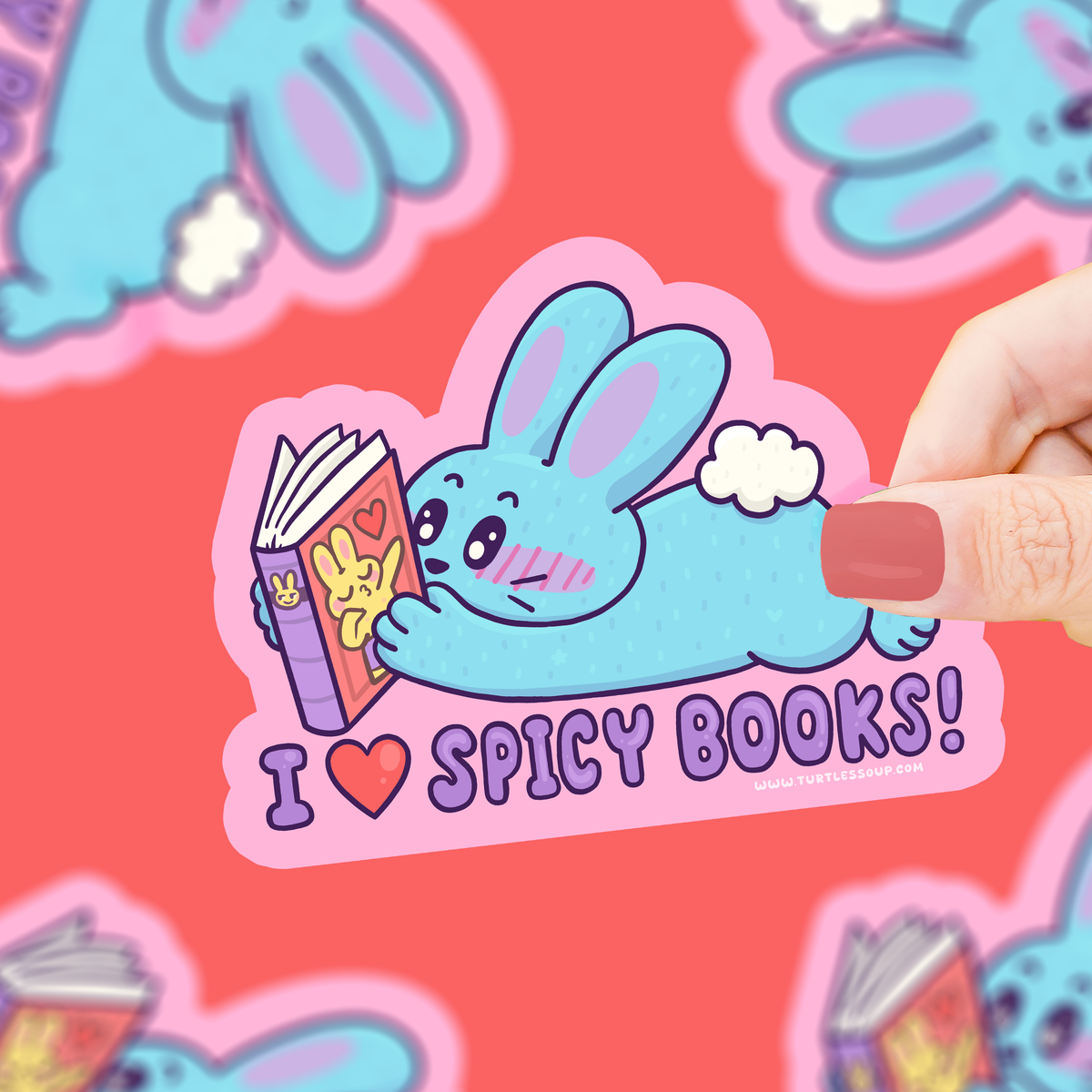 Sticker of a blue bunny reading a book with &