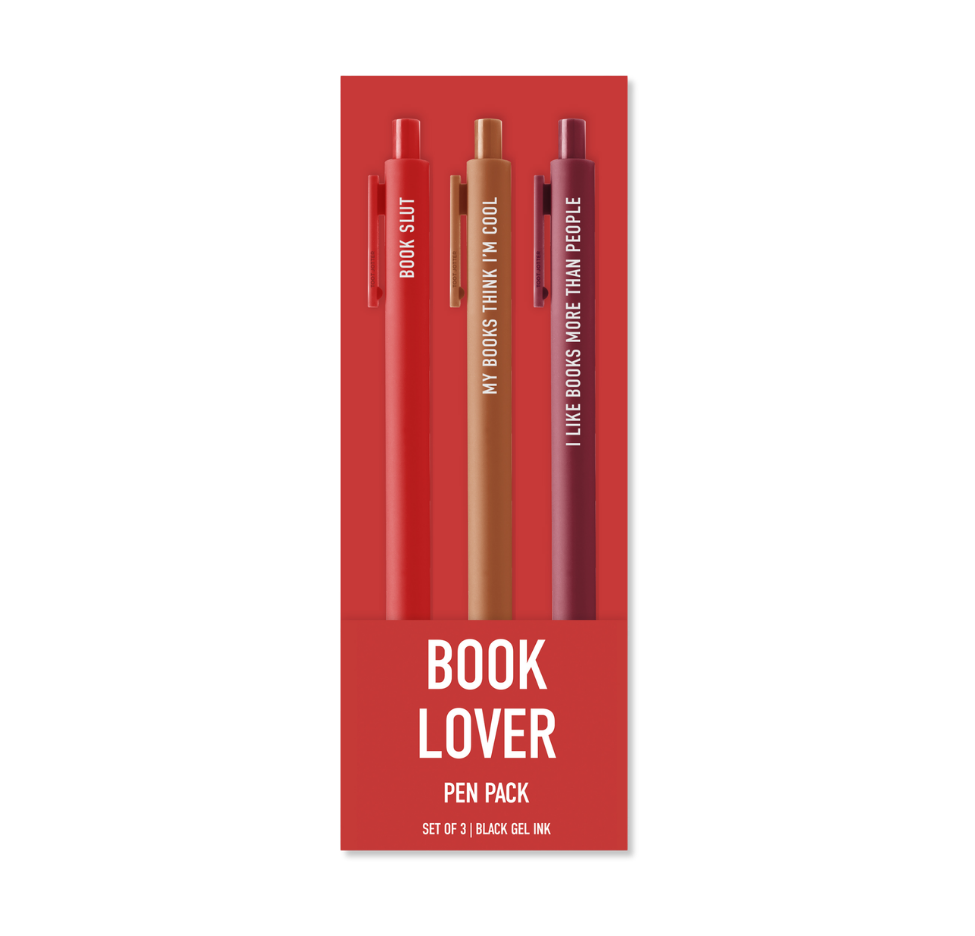 A red book lover pen pack containing three pens with humorous quotes printed vertically on them, set against a plain white background.