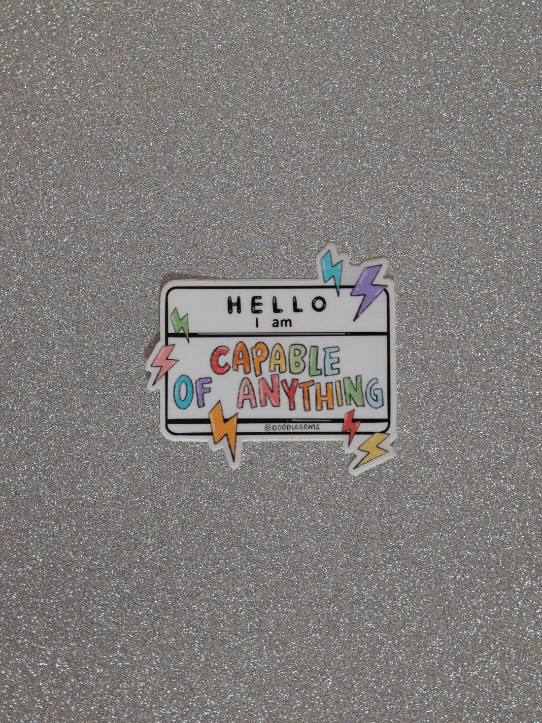 Motivational sticker on a textured gray background
