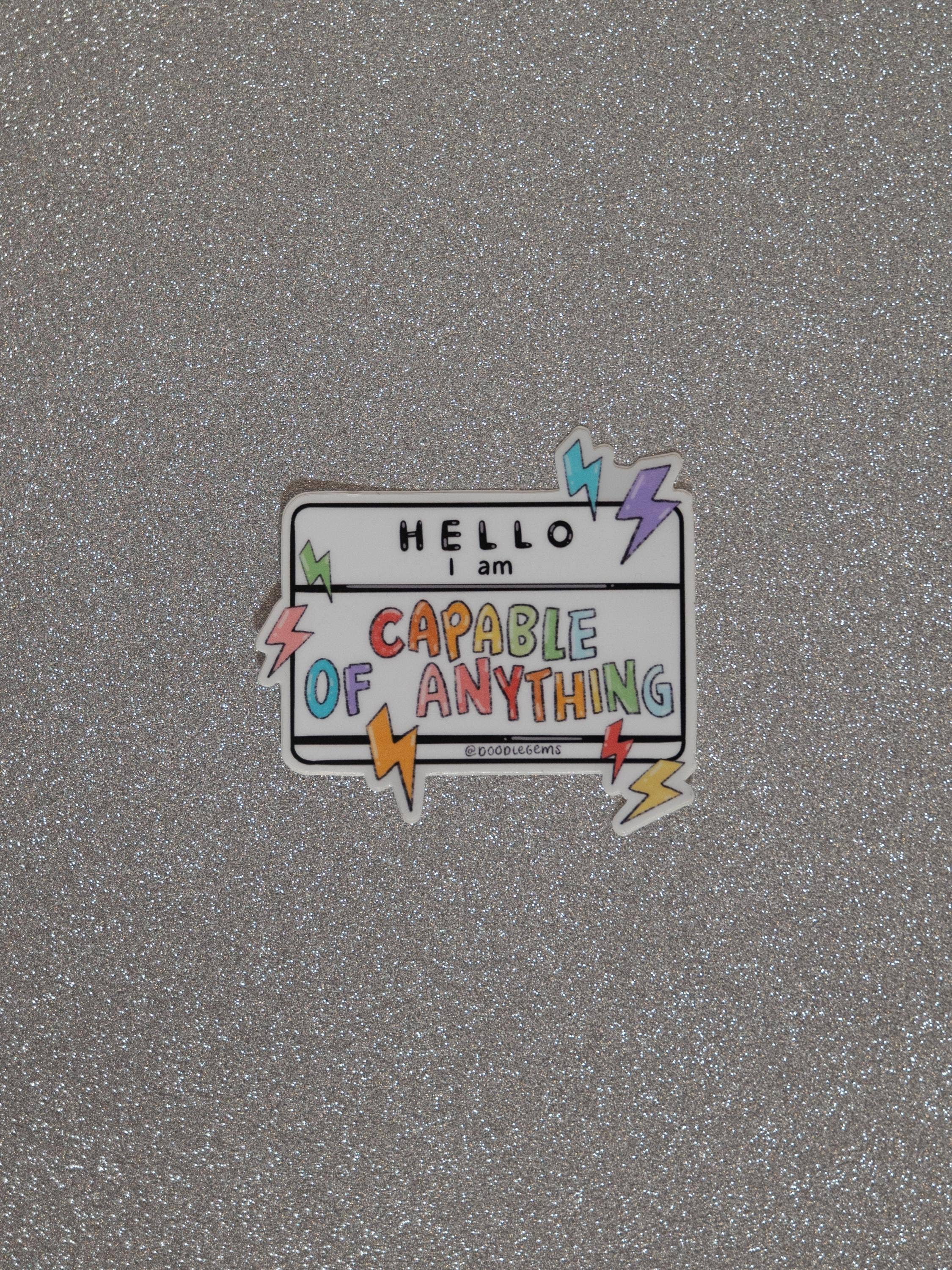 Motivational sticker on a textured gray background