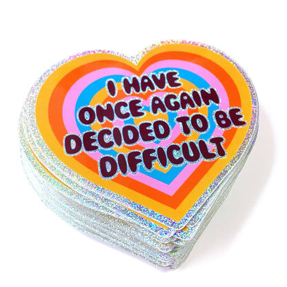 Stack of heart-shaped cards with colorful text on a white background