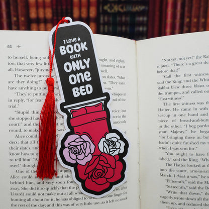 Bookmark with roses and text on an open book