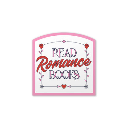 A decorative sign with a pink border and the text &