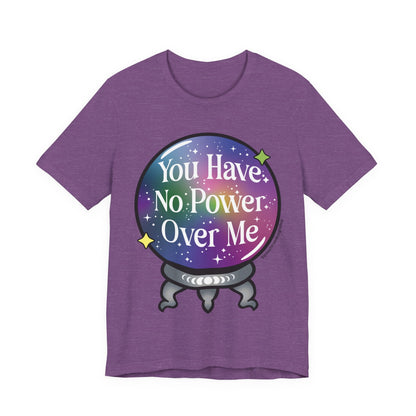 A heather purple short-sleeve t-shirt with a graphic of a crystal ball containing a rainbow galaxy background and the text &