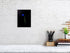 Fine art photograph of an electric blue tulip flower bulb and stem on a black background art prints for sale gifts home decor