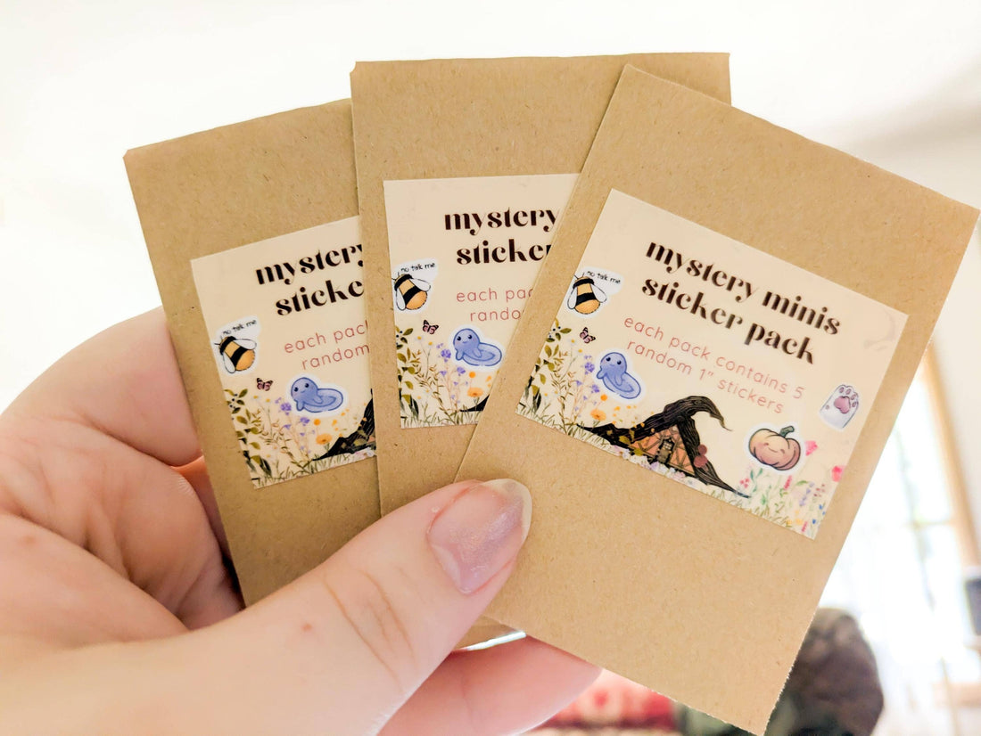 Three brown paper packages labeled &