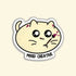 A die-cut sticker featuring a cute cream-colored cartoon cat with large black eyes, holding a paintbrush with pink paint, and the text &