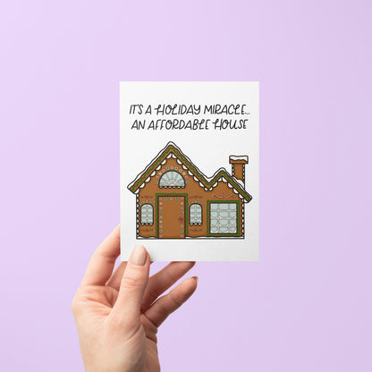 Affordable Gingerbread House Card detail — hand lettered housing market humor Christmas card by indie artist MangoIllustrated