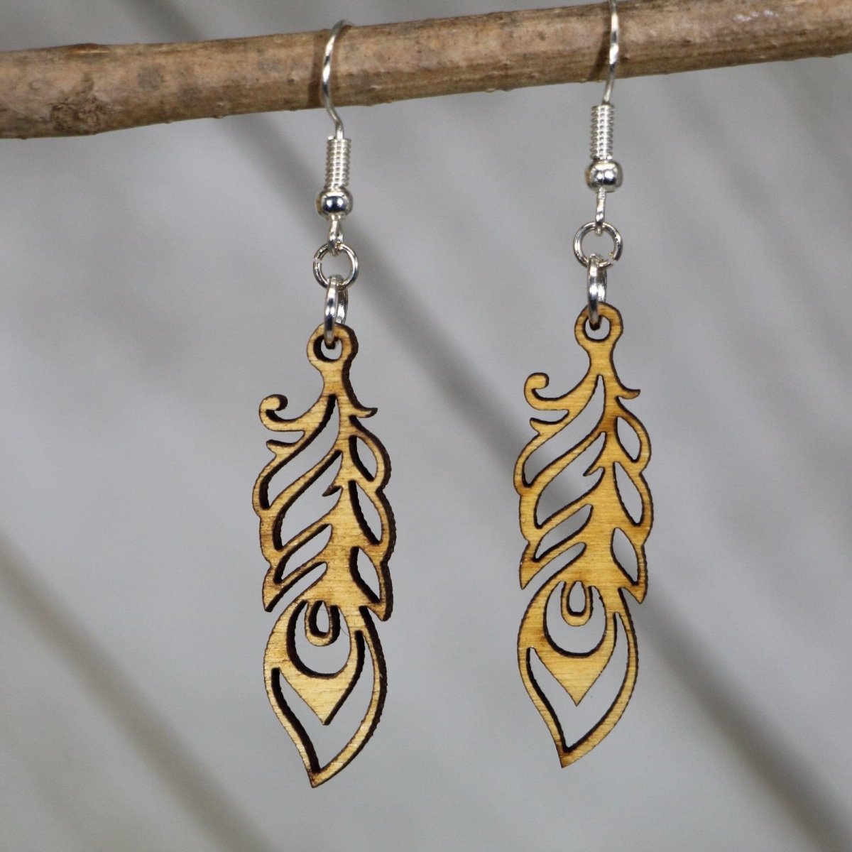 Hand-painted wooden Art Nouveau feather dangle earrings with elegant flowing design and hypoallergenic sterling silver hooks, lightweight feather statement jewelry earrings for vintage-inspired and boho style